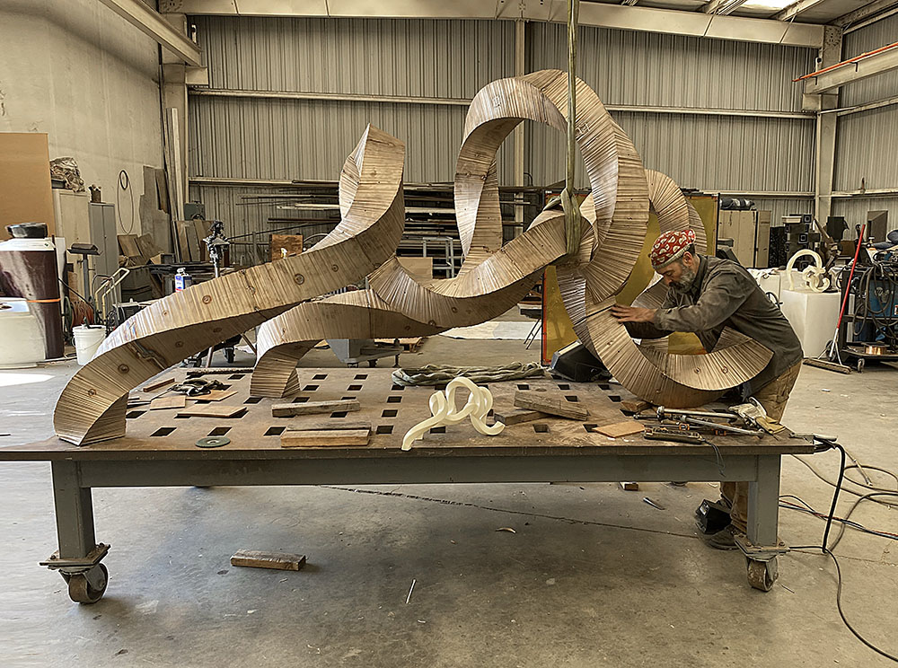 Welding a large bronze casting